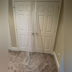 Chapel length wedding veil.